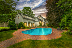 Experts adding staging details in editing house photos.