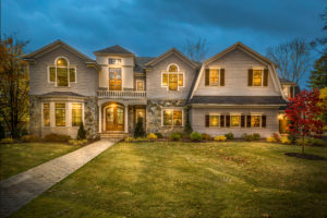 Photographers checking their newly-edited house listing photos.