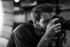 A professional offering real estate photo editing in CA